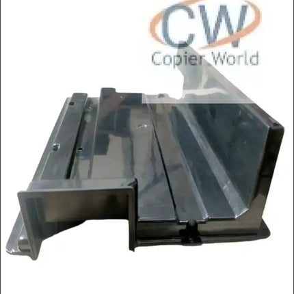 The Canon Drum Unit Cover for IR6000 / 5075 is a metal bracket or tray with angled edges and multiple screw holes, designed for mounting or supporting drum unit covers, shown on a white background.