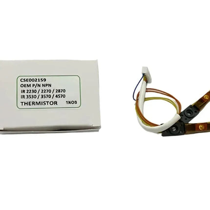 A white box labeled “CSE002159 OEM P/N NPN” sits beside a coiled Copier World Thermistor for Canon IR 2230, 2270, 2830, 2870, 3025, 3030, 3530, 3570, and 4570 models with connectors for temperature sensing.